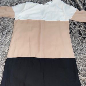 White , Black and Tan flare shirt